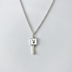 White Enamel Playboy Key Necklace image 0