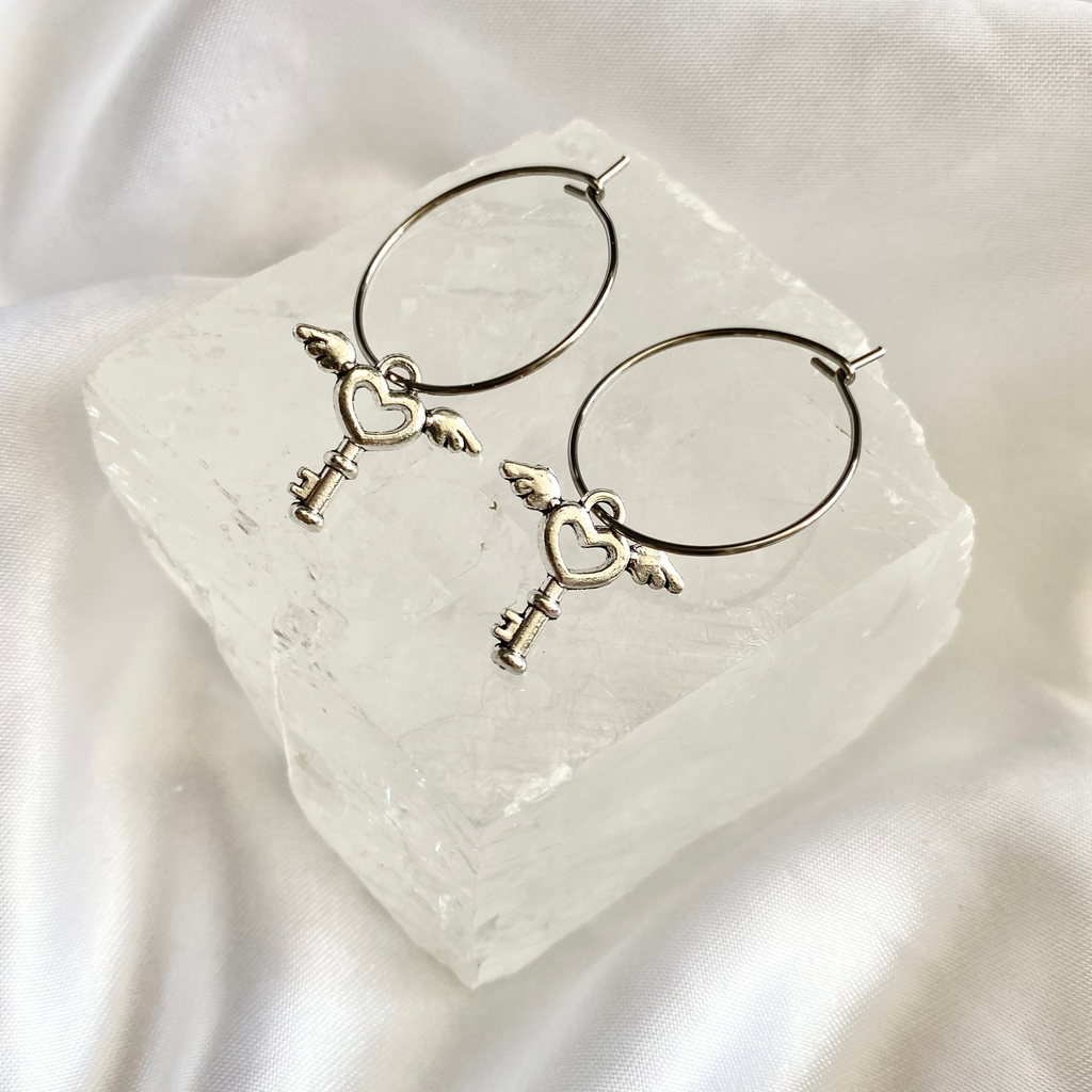 Winged Key Hoop Earrings image 0